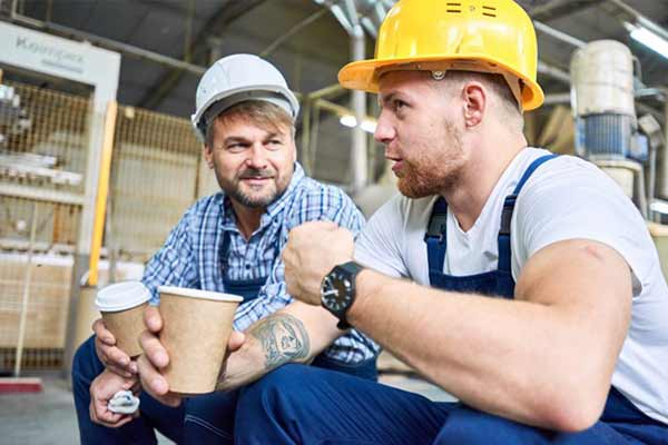 Tradespeople discussing work